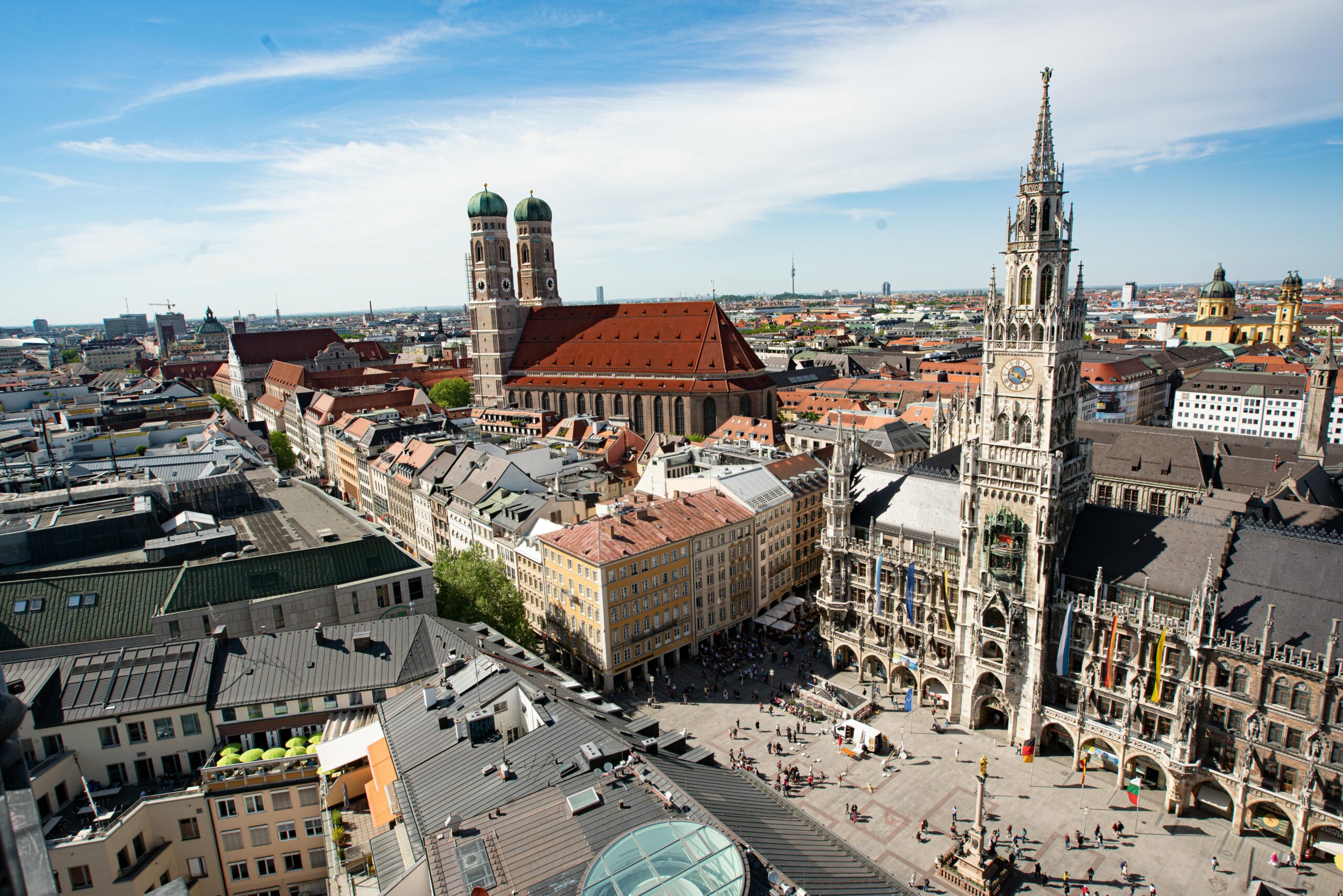 Majestic aerial view of Munich's Marienplatz and Frauenkirche showcasing historic architecture.